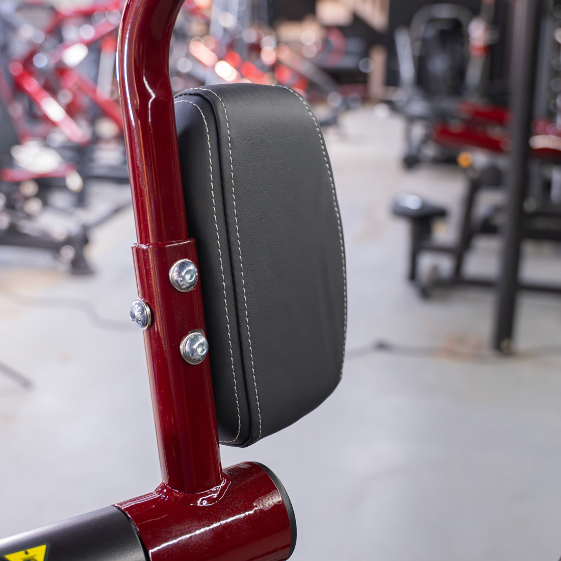 muscle d fitness commercial plate loaded power leverage v2 black and maroon pull-over machine detail