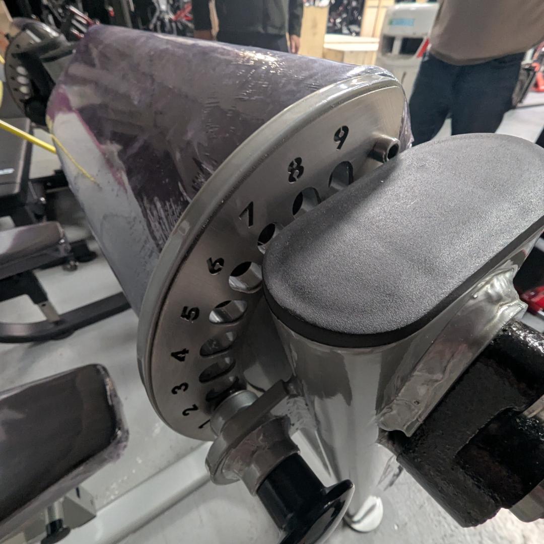 silver preacher curl bench with adjustable pad details