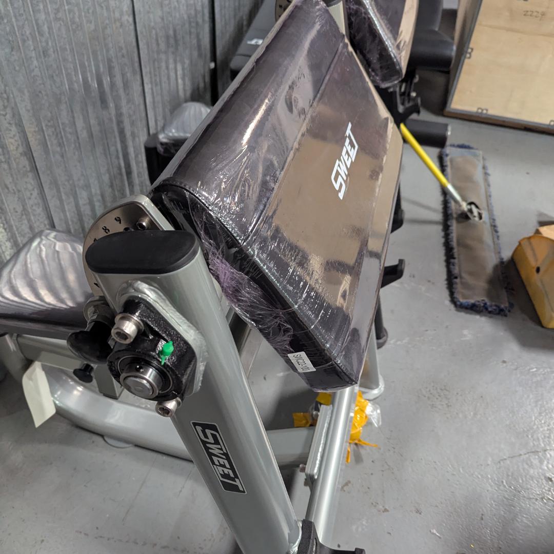 silver preacher curl bench with adjustable pad