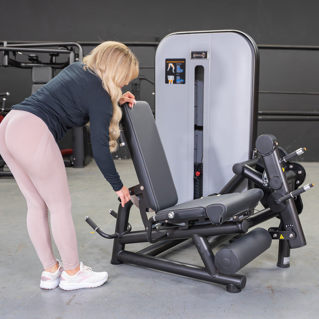 muscle d fitness commercial selectorized vogue black and light grey leg extension prone leg curl combo machine