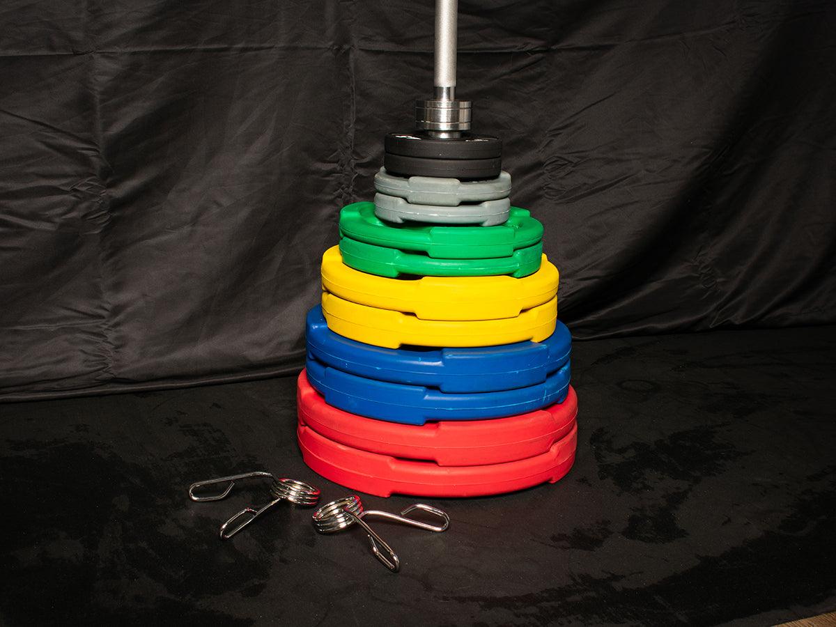 PLACAS OLÍMPICAS RECUBIERTAS DE GOMA: Placas olímpicas de goma de colores (2,5, 5, 10, 25, 35, 45 lb) por par