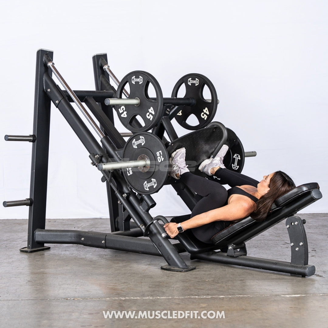 Person using a 45 Degree Leg Press machine with weights in a gym setting
