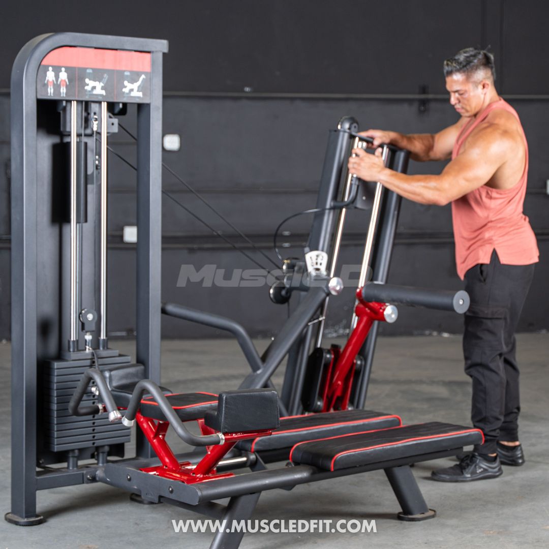 Man using a Classic V2 Glute Kickmachine with 'Muscle D Fit' branding in the background.