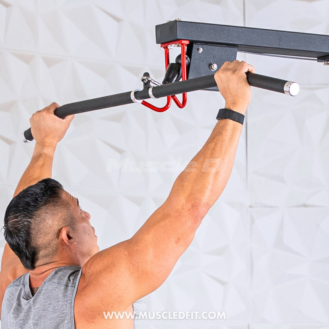 Man performing Lat pulls  on a Classic V2 Lat Pulldown Low Row Combo with a white wall.