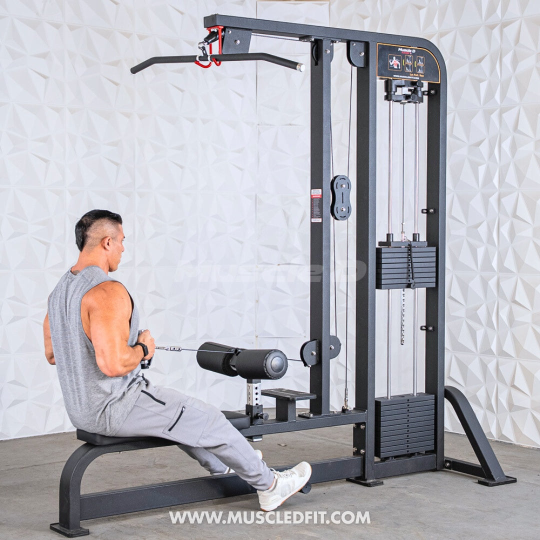 Man using a Classic V2 Lat Pulldown Low Row Combo machine in a gym setting with a textured white wall background.