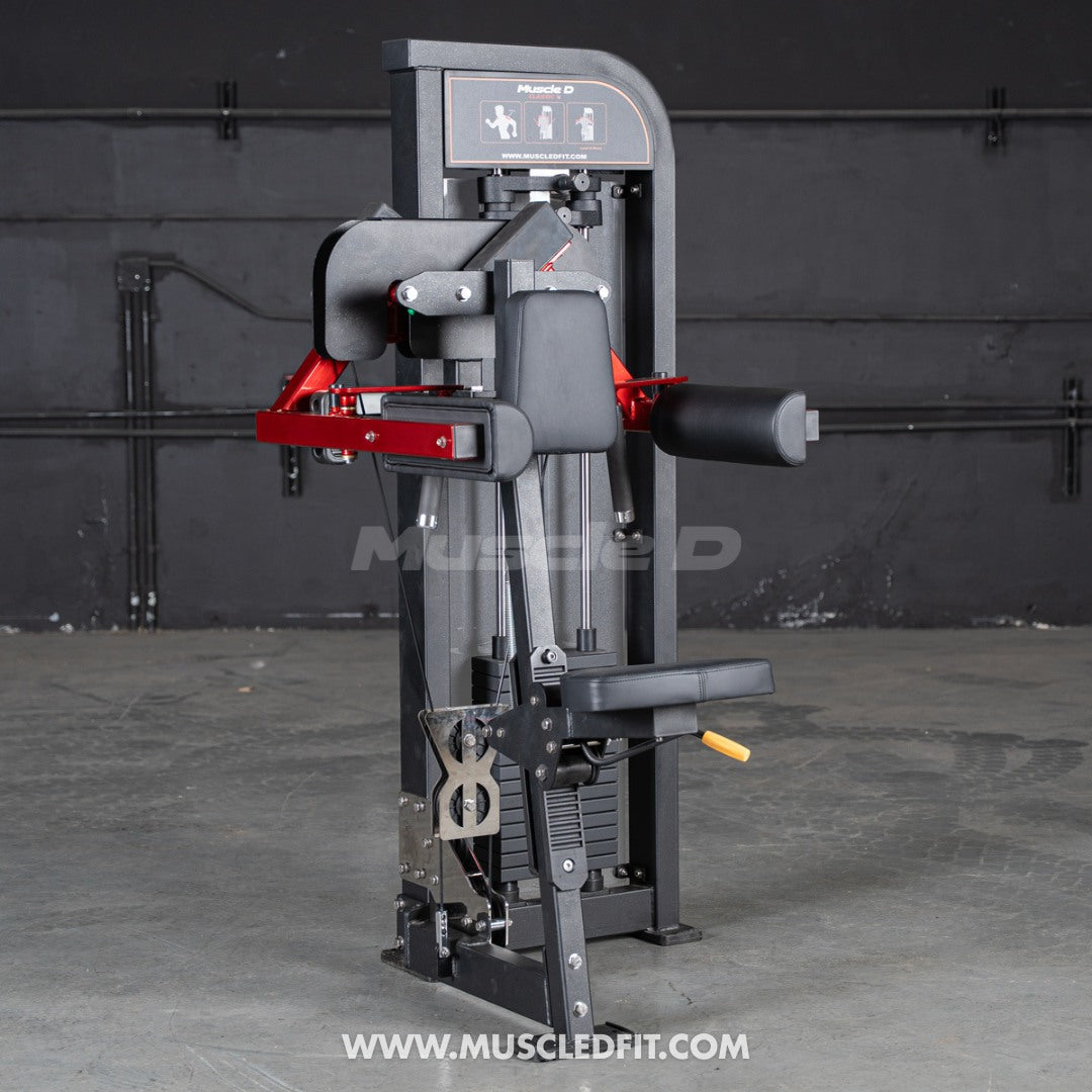 Muscle D Lateral Raise machine with red accents on a gray floor and black wall background