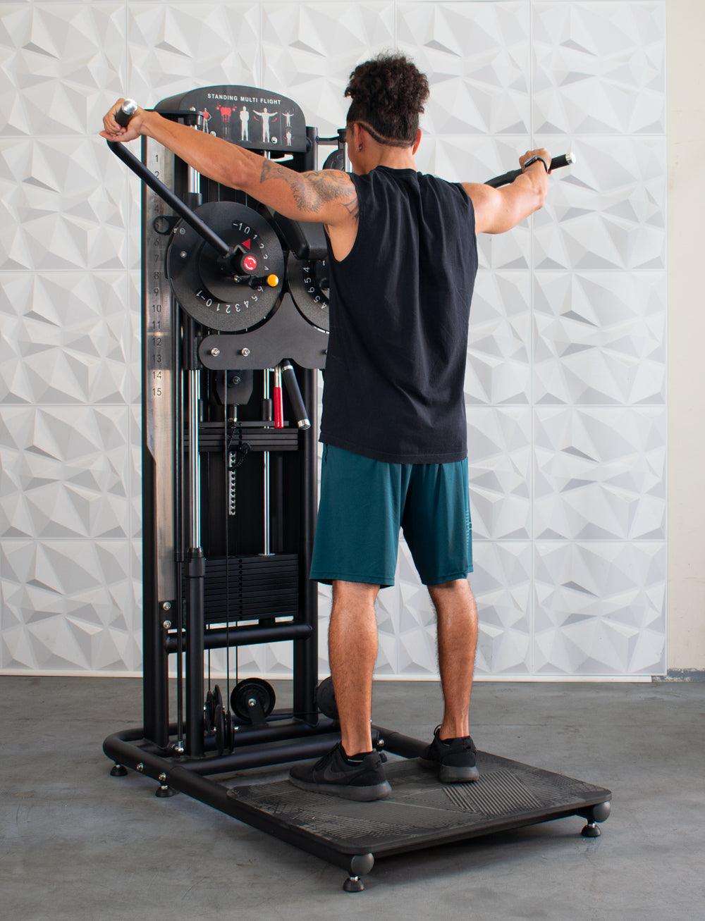 Man using the Classic Vw Muscle-Flight Trainer in a gym setting by Muscle D Fitness.