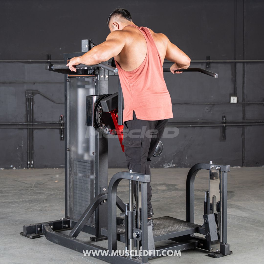 Person using a Classic V2 Multi Hip  machine in a fitness setting with 'Muscled Fit' branding.