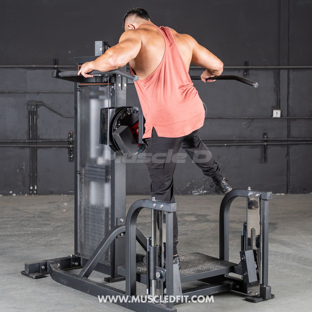Man exercising on a Classic V2 Multi Hip  machine with 'Muscle D' branding in the background.