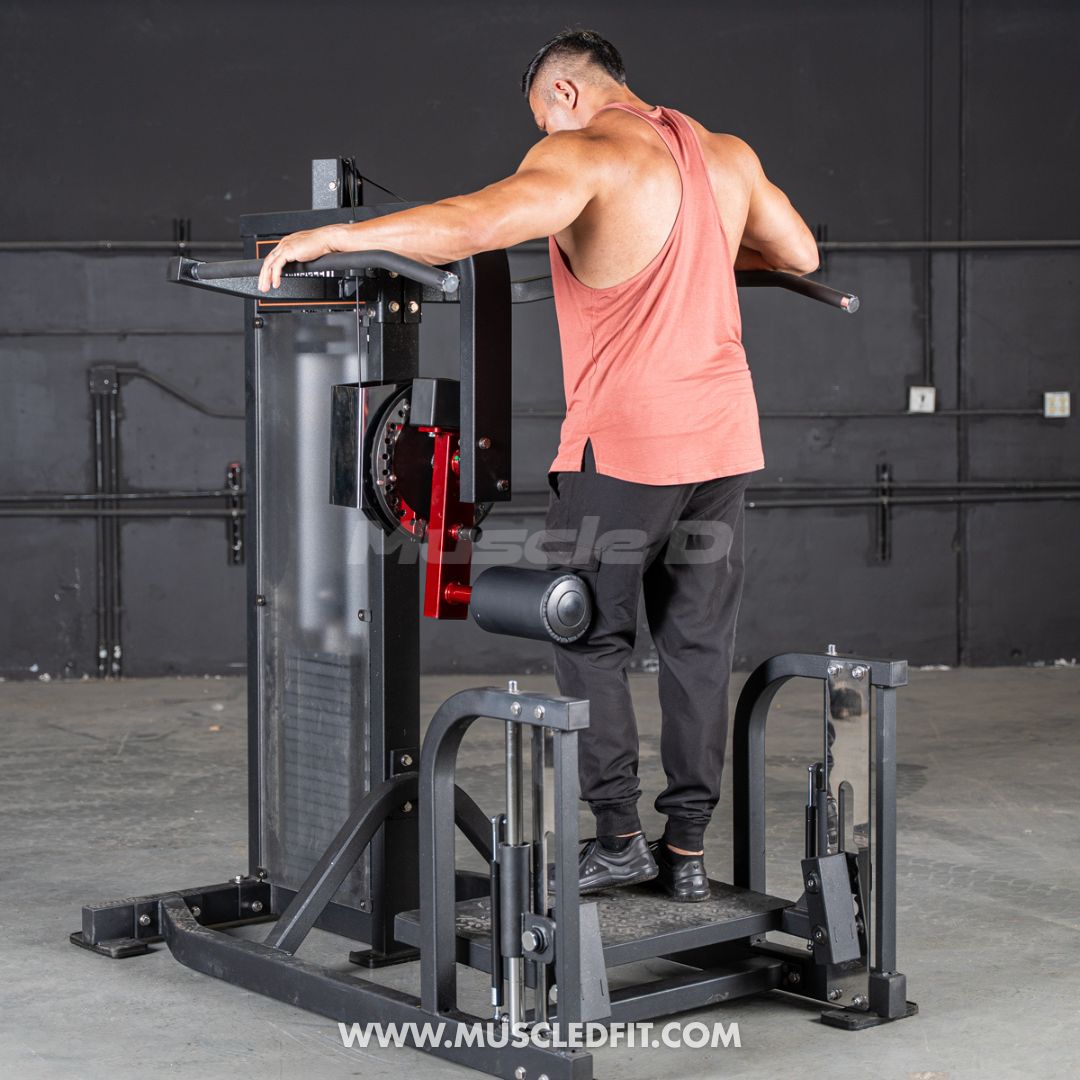 Man using a Classic V2 Multi Hip  machine in a fitness studio with 'Muscleclad' branding.
