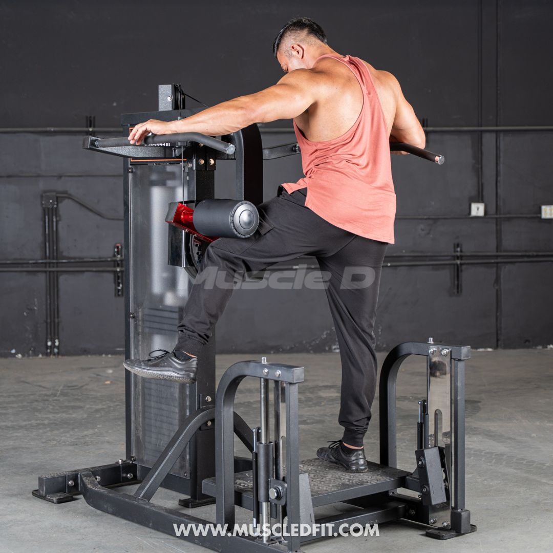 Man using a Classic V2 Multi Hip  machine in a gym setting with 'Muscle D' branding.