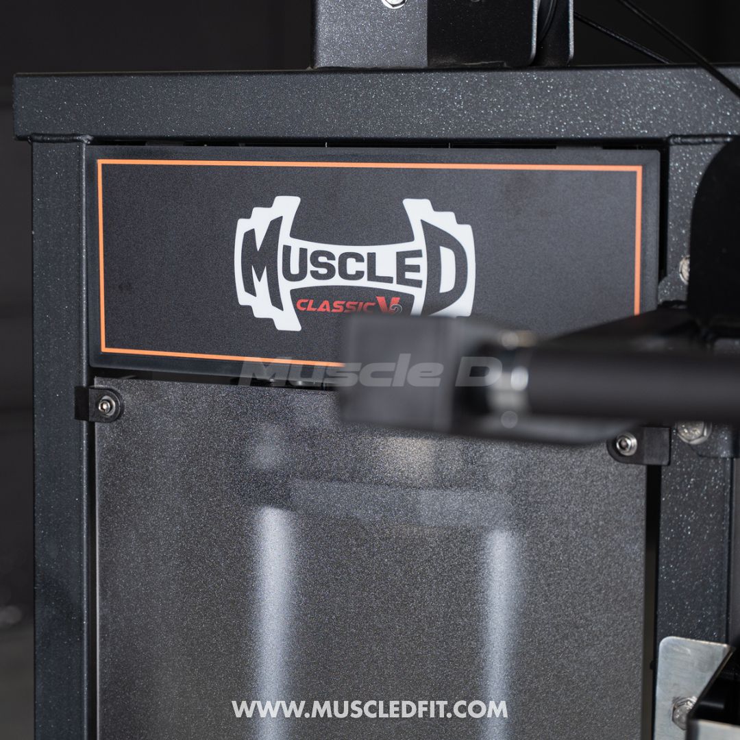 Close-up of a black Classic V2 Multi Hip  with 'Muscle D' branding on a dark background
