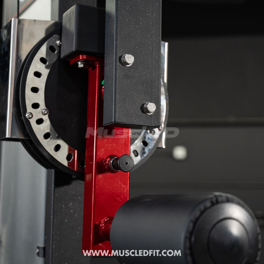 Close-up of a Classic V2 Multi Hip  machine with red and black components, featuring the Muscled Fit brand.