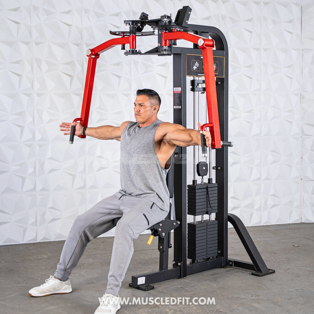 Man exercising on a Classic V2 Pec/Rear Delt Combo machine with a white textured wall background