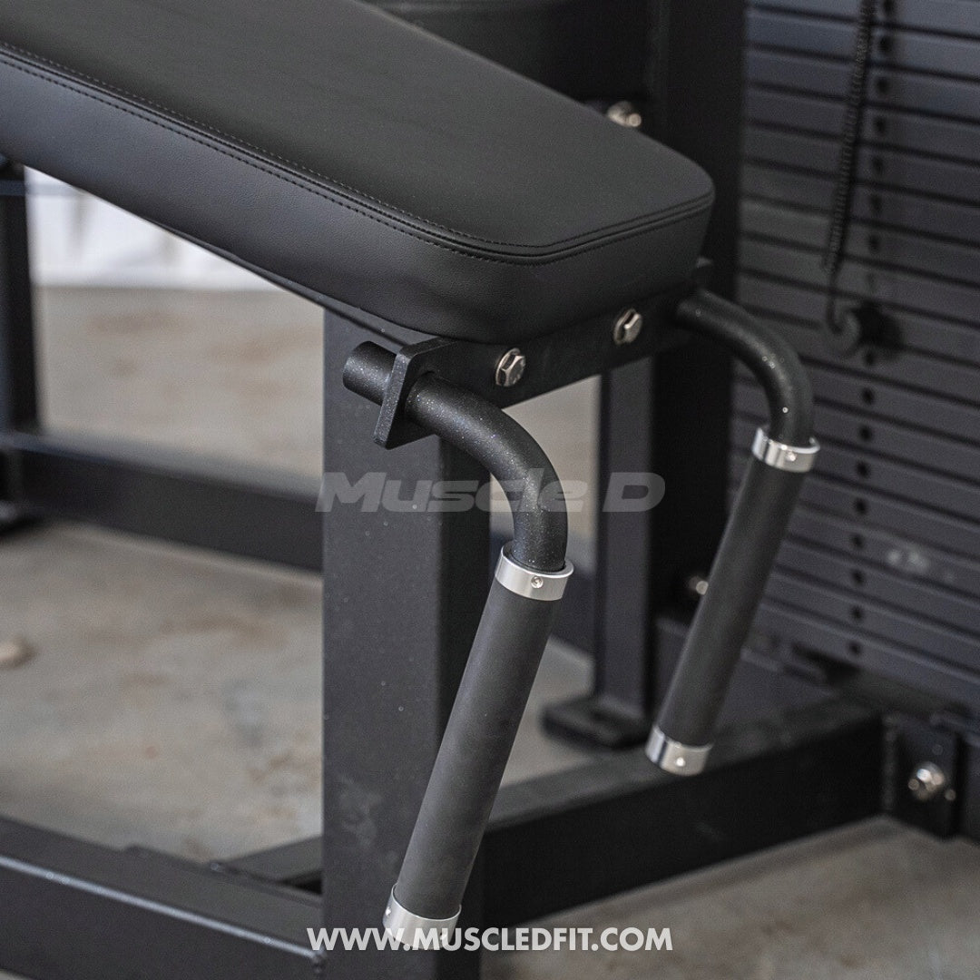  Classic V2 Prone Leg Curl  with 'Muscle D' branding in a gym setting