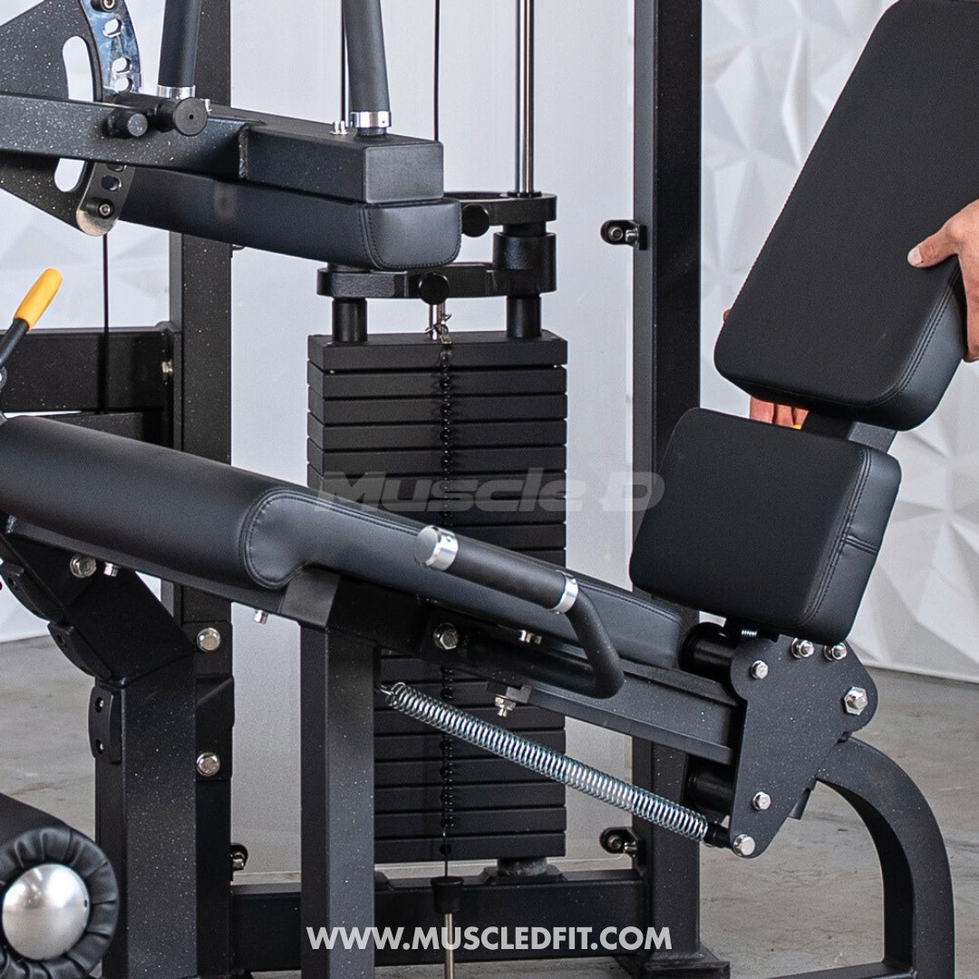 Classic V2 Seated Leg Curl machine with a person adjusting settings, featuring the brand 'Muscle D Fit'.