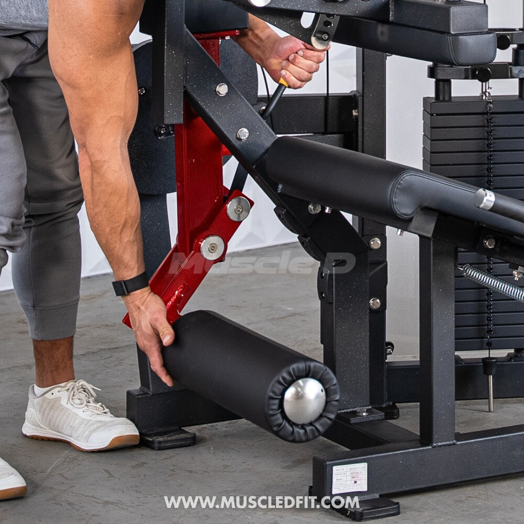 Person adjusting a Classic V2 Seated Leg Curl machine with 'Muscle D Fit' branding.