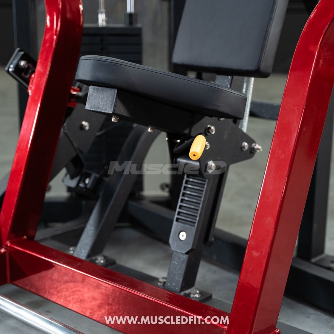 Close-up of a red and black Classic V2 Selectorized Chest Press machine with 'Muscle D' branding.