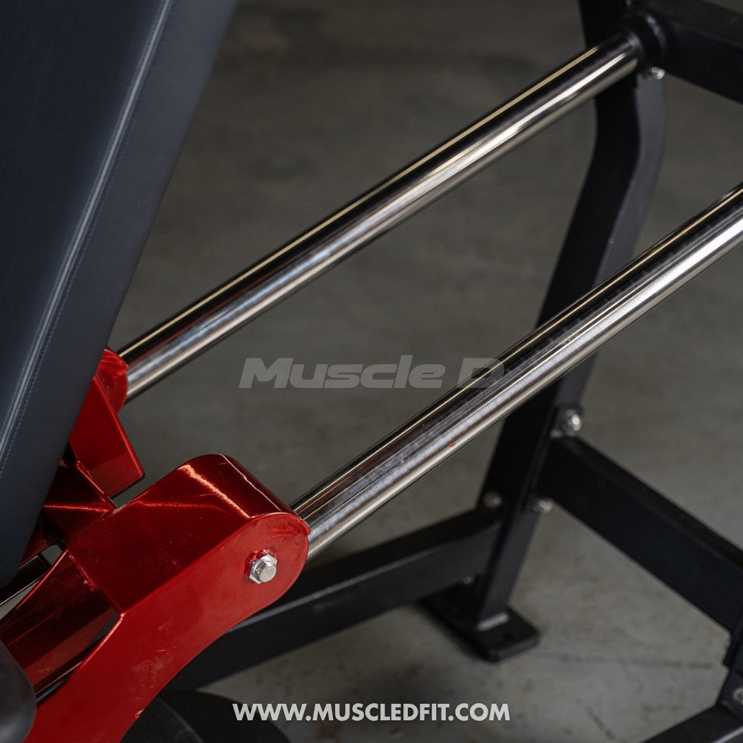 Close-up of a Classic V2 Selectorized Leg Press machine with red and black components, featuring the brand 'Muscle D'.