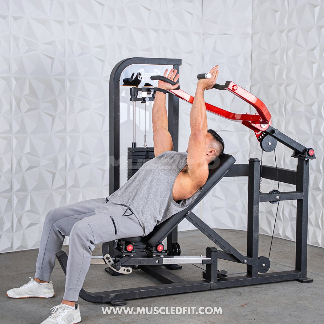 Person using a Classic V2 Selectorized Multi-Press Chest & Shoulder Press  machine with a gray wall background