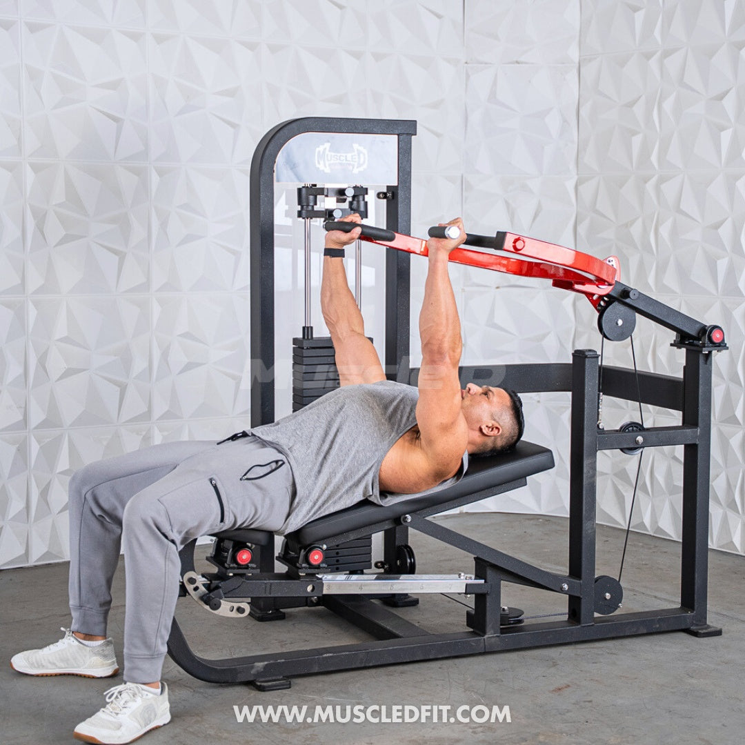 Person using a Classic-V2-Selectorized-Multi-Press-Chest_Shoulder-Press-Machine machine with a gray textured wall in the background