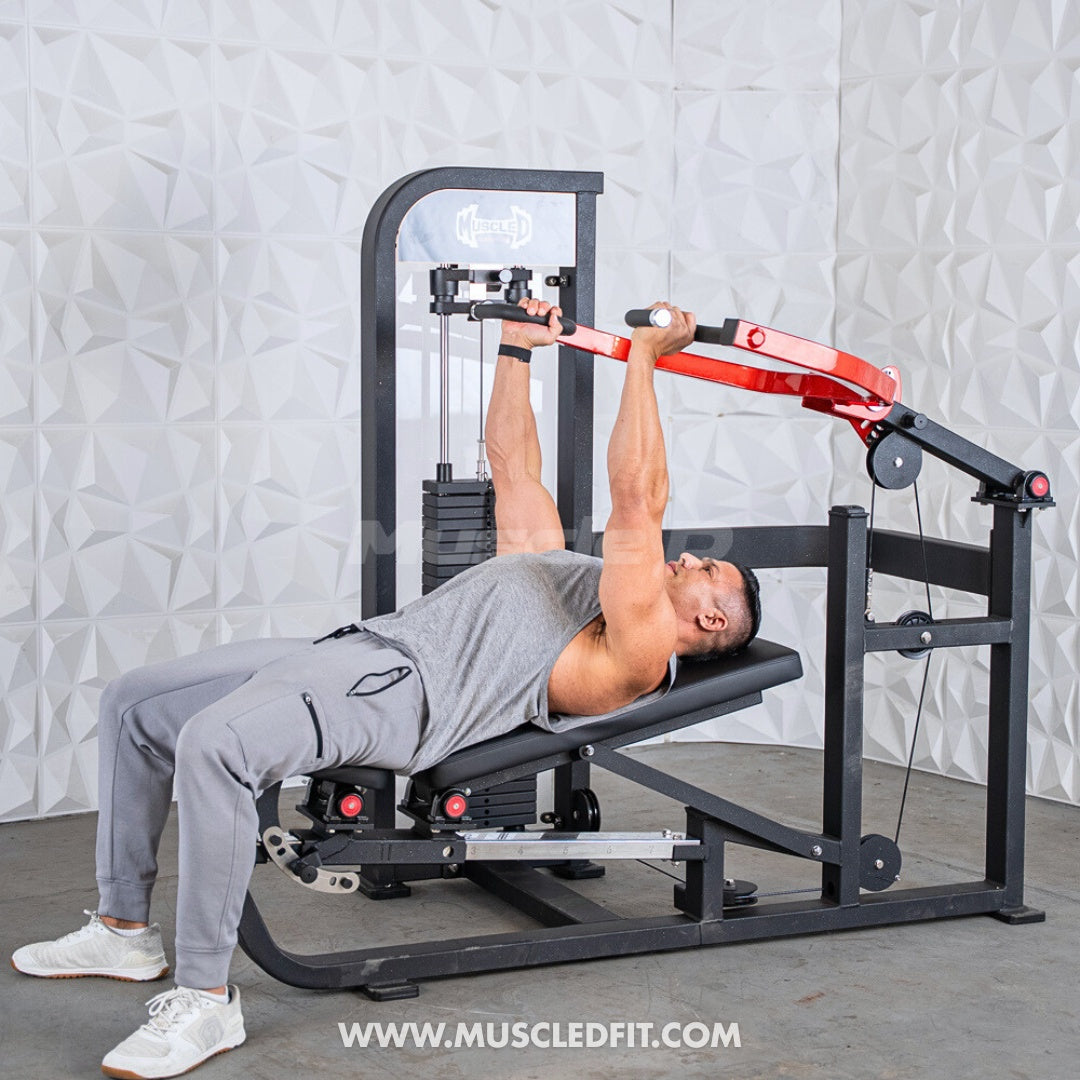 Person using a Classic-V2-Selectorized-Multi-Press-Chest_Shoulder-Press-Machine in a gray room with 'Muscle D Fit' branding.