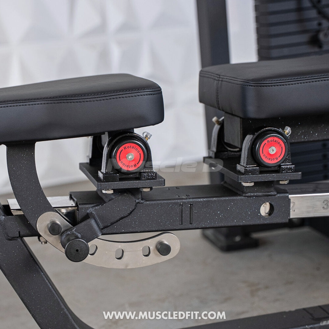 Close-up of a Classic V2 Selectorized Multi-Press Chest & Shoulder Press  machine with red weight plates on a white background