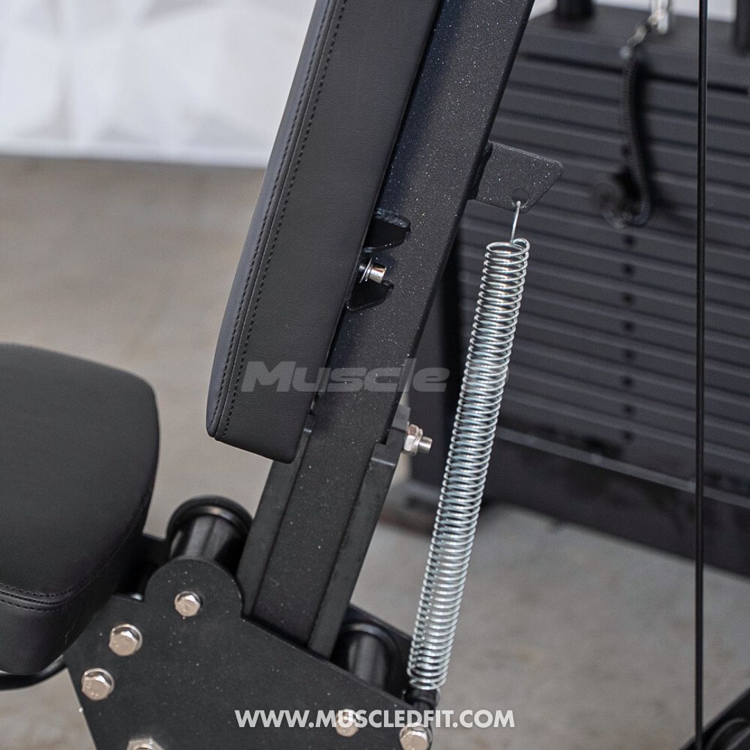 Close-up of a Classic V2 Shoulder Press  machine with 'Muscle' branding and website URL.