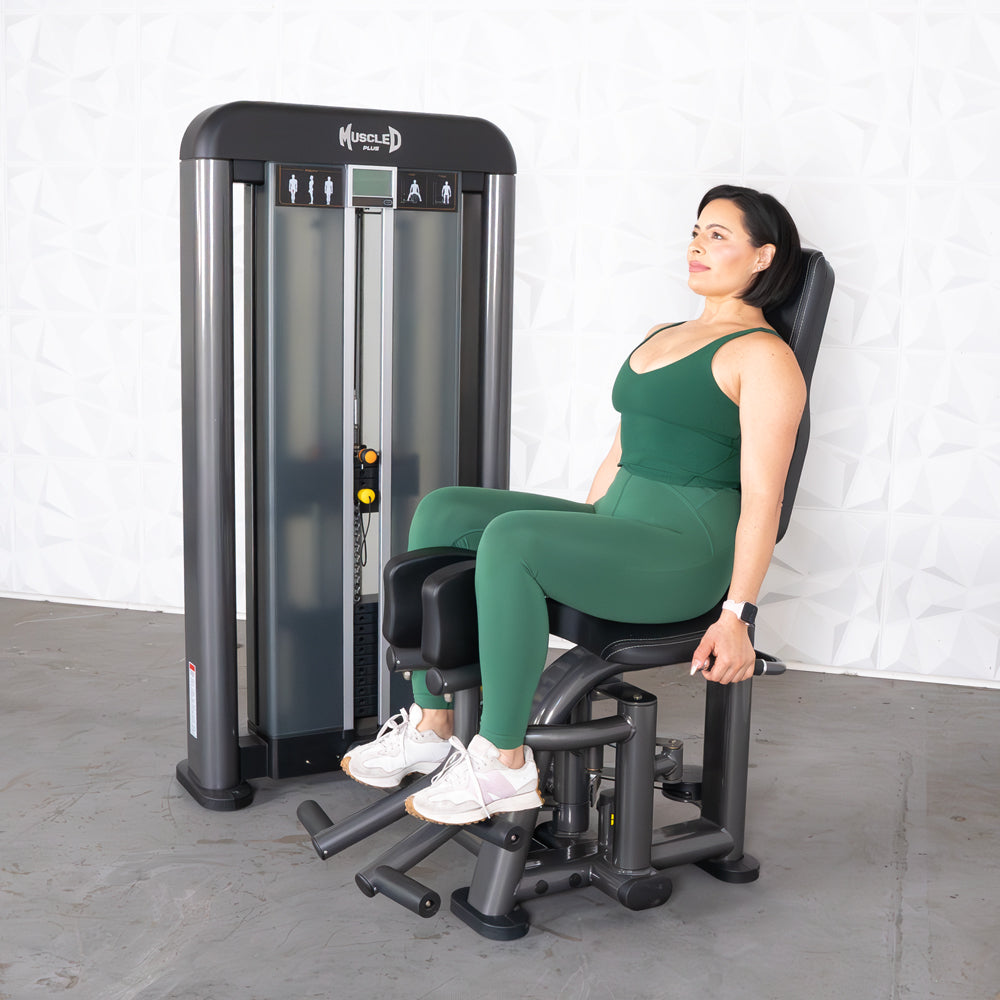 commercial selectorized black and dark grey inner thigh machine