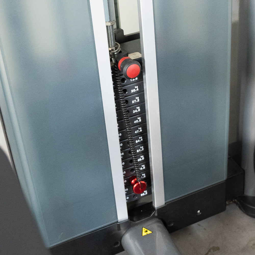 commercial black and dark grey selectorized lat low row combo machine detail