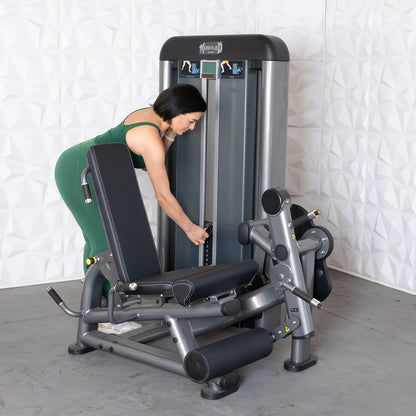 commercial black and dark grey selectorized leg extension prone leg curl combo machine