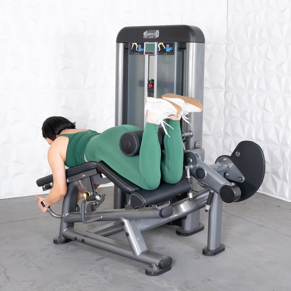 commercial black and dark grey selectorized leg extension prone leg curl combo machine