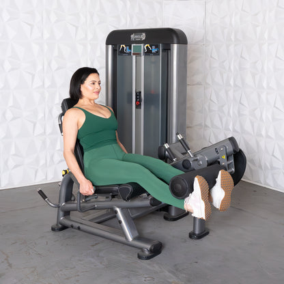 commercial black and dark grey selectorized leg extension prone leg curl combo machine