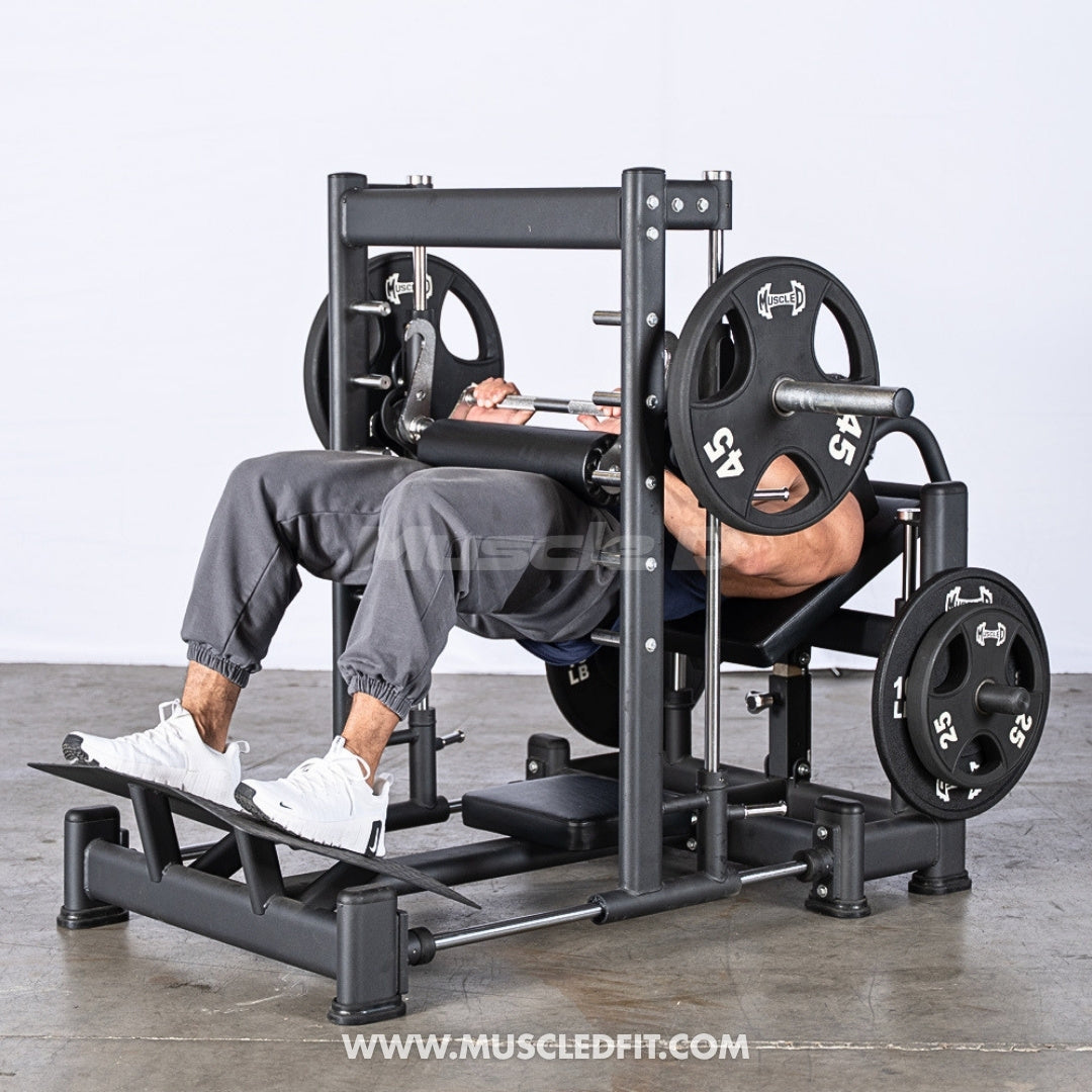 Person using an Excel 3D Smith Machine Hip Thruster weight machine in a gym setting with 'Muscle D Fit' branding.