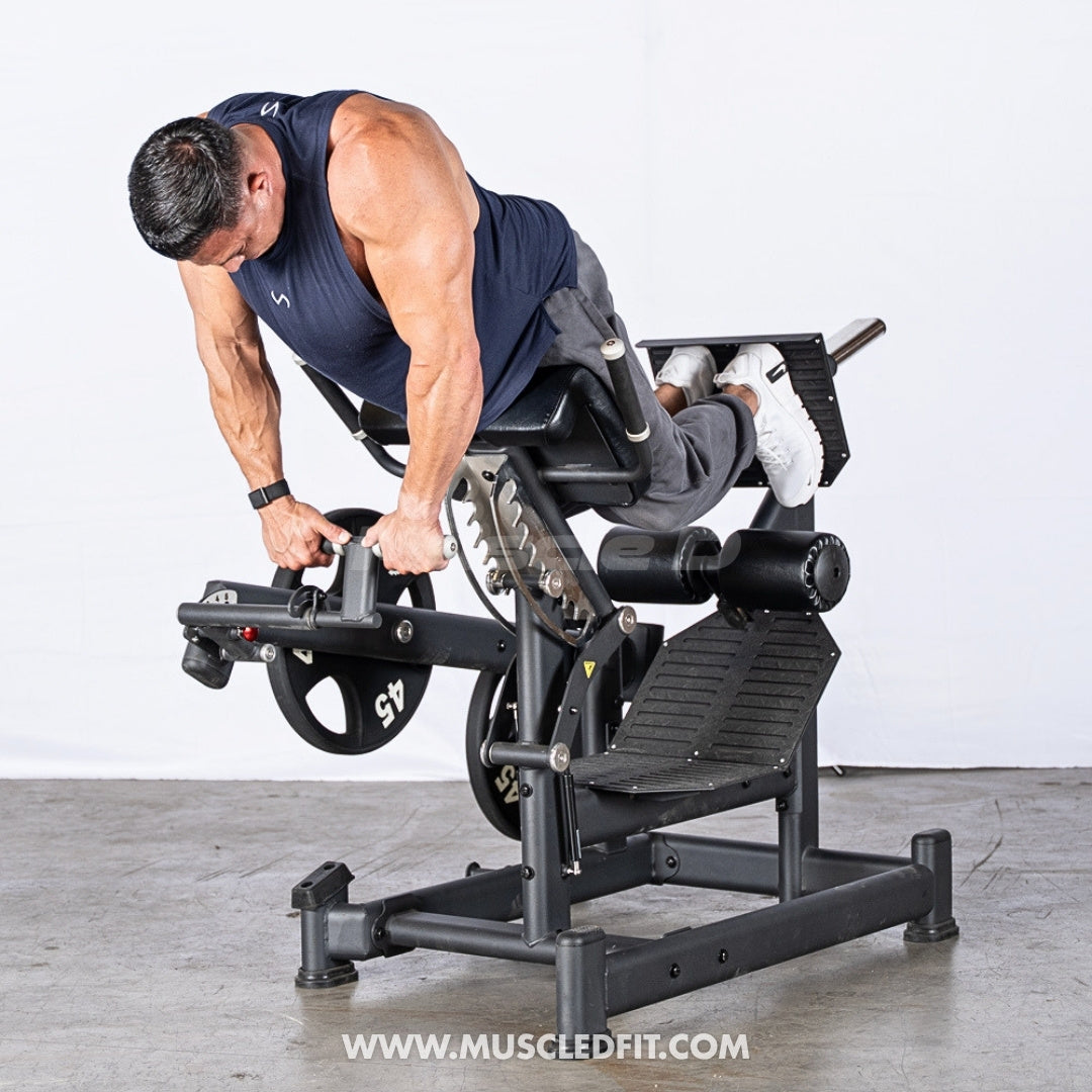 Man using an Excel 45 degree back and glute extension machine in a gym setting