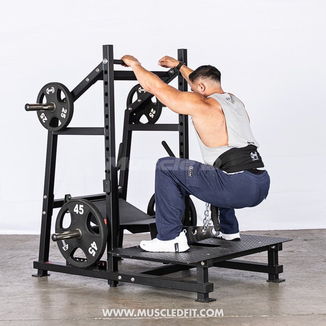 Man using an Excel Belt Squat machine by Muscle D Fitness with weights on a white background