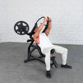 Bodybuilder training on an Excel Leverage Incline Pec Fly