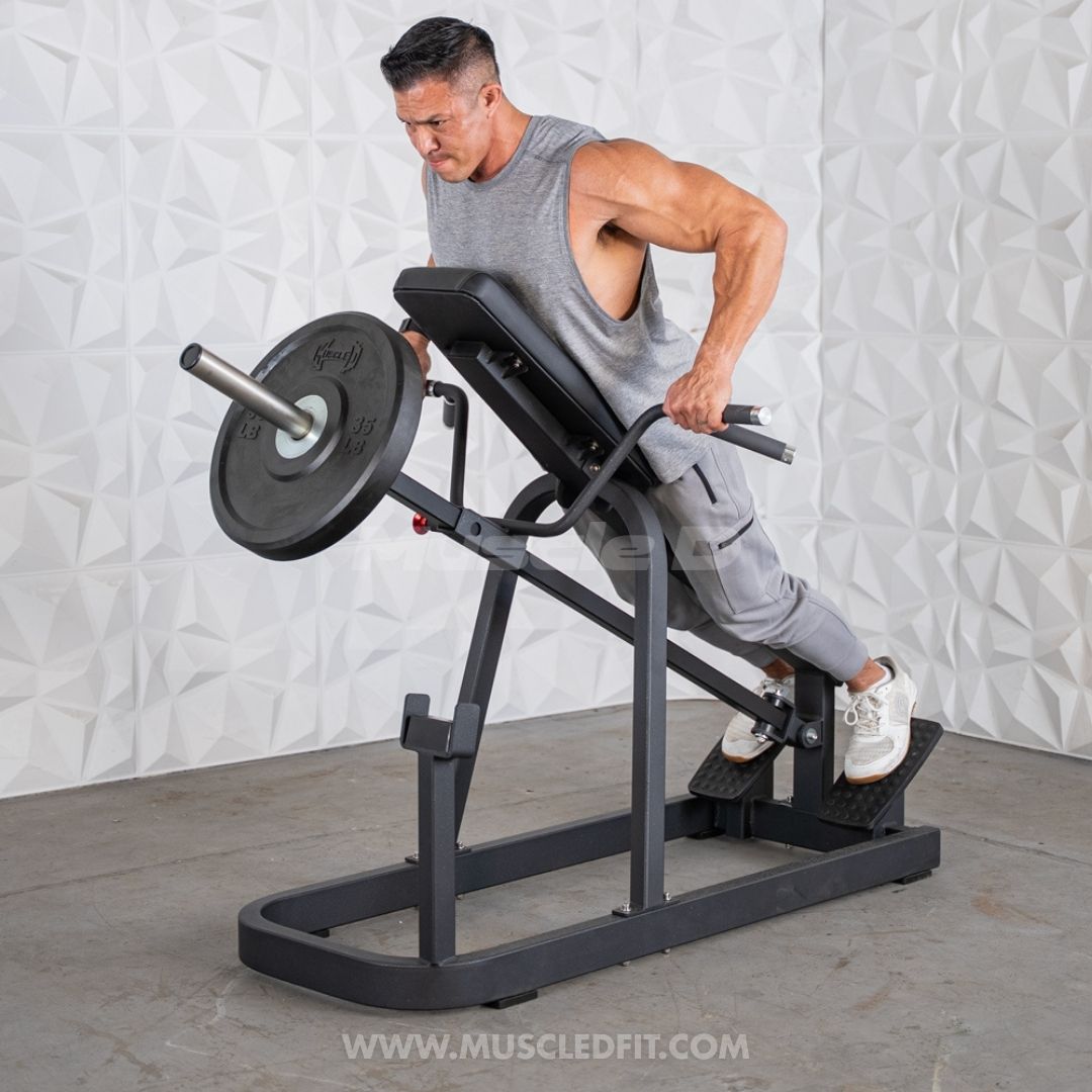 Man exercising on an Excel T-Bar Row machine in a gym setting