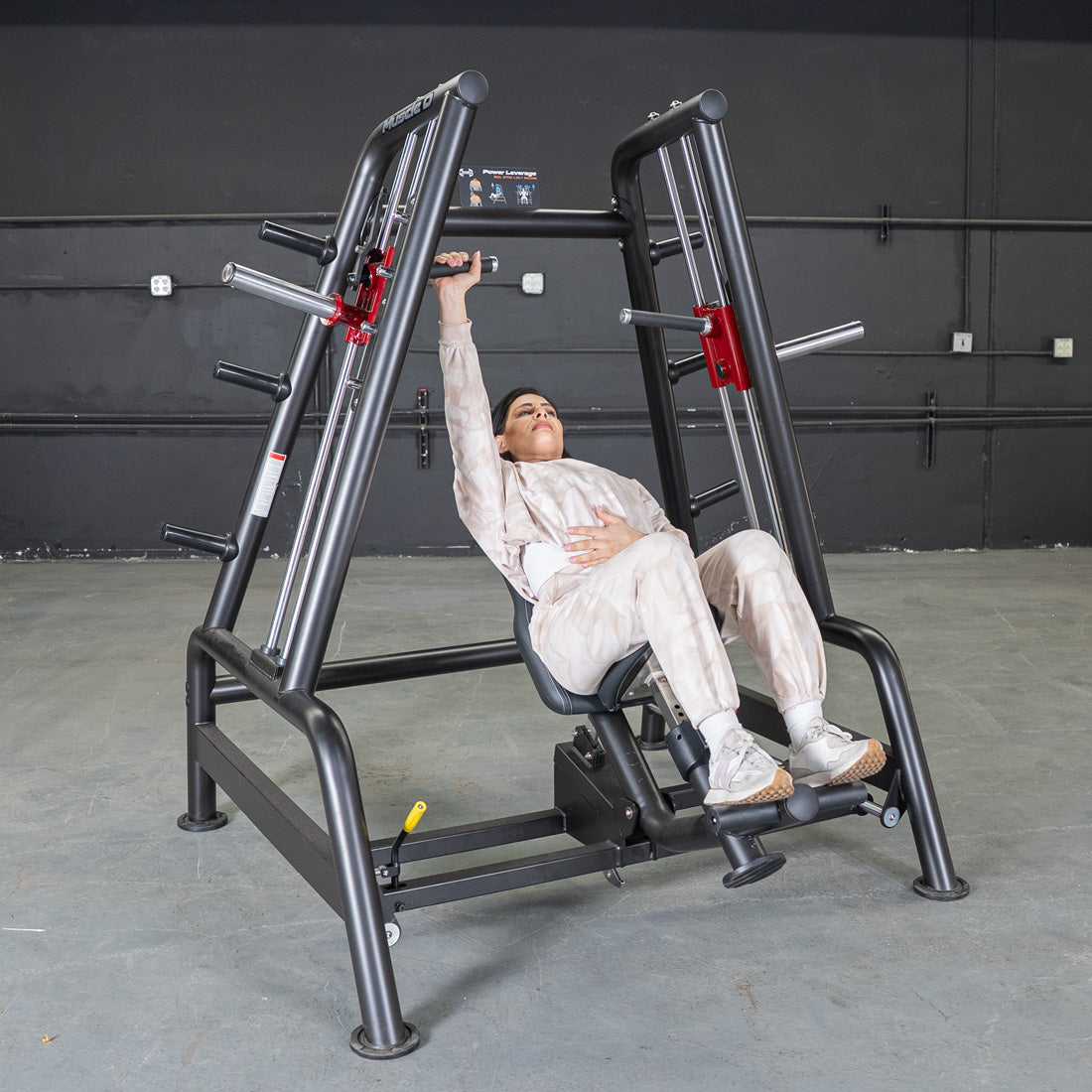 Muscle D black and maroon commercial convergent bench machine.