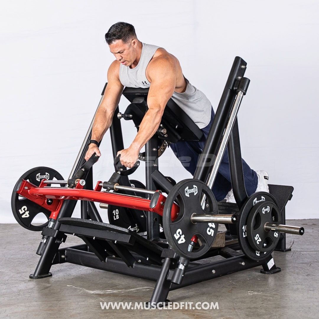 Man exercising on a Pro-Strength Convertible Orbital Linear Bearing Row machine with weights in a gym setting.