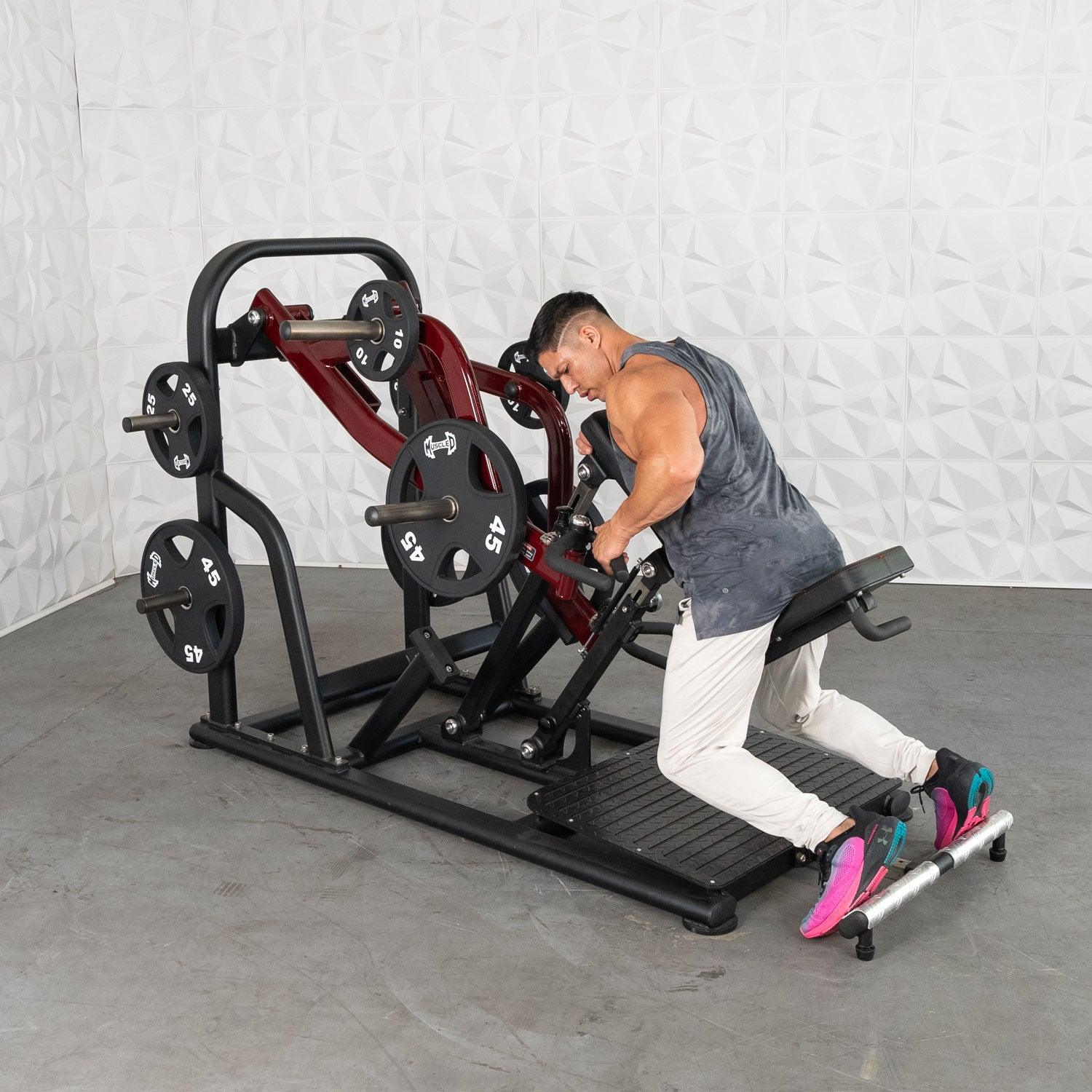 Man using a Pro Strength Dynamic Row in a gym setting by Muscle D Fitness