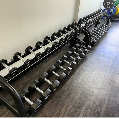 black dumbbell set five to a hundred pounds sets includes twenty pairs of dumbbells on two ten pairs dumbbell rack that is sold separately