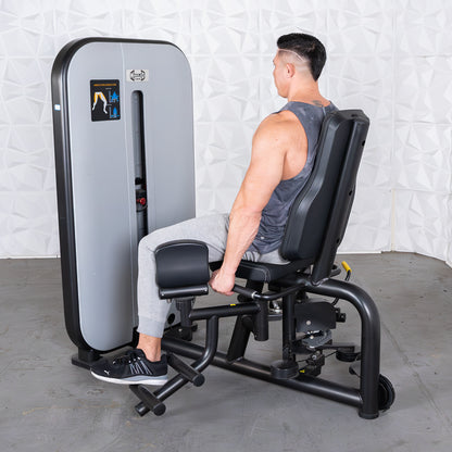 commercial grade black and white selectorized inner outer thigh combo machine