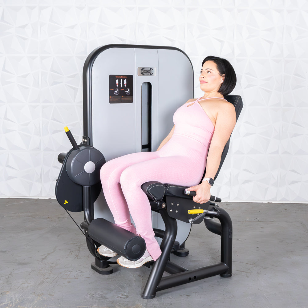 commercial grade black and white selectorized leg extension machine