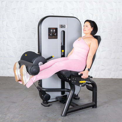 commercial grade black and white selectorized leg extension machine