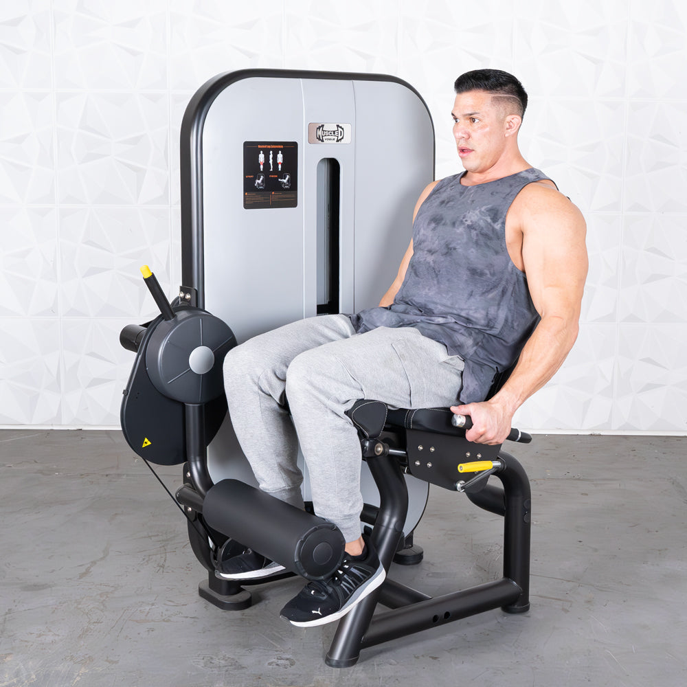 commercial grade black and white selectorized leg extension machine