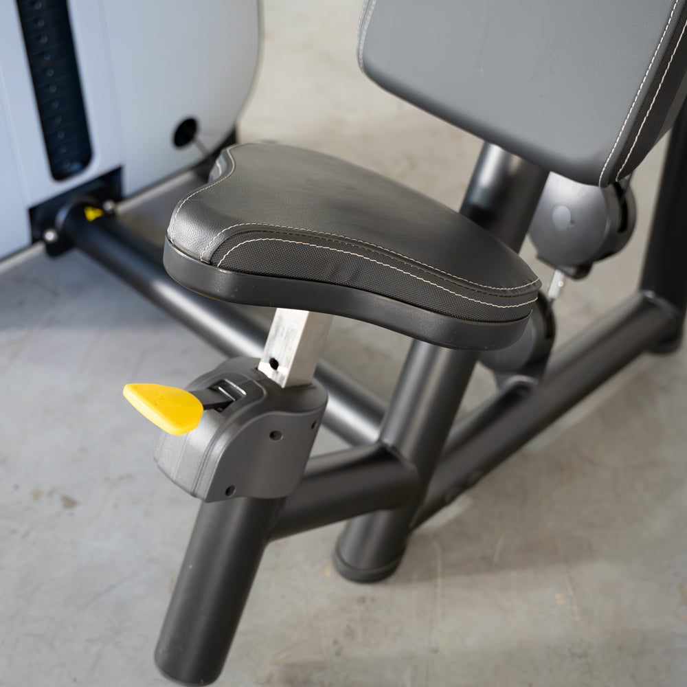 commercial grade black and white selectorized triceps extension machine detail